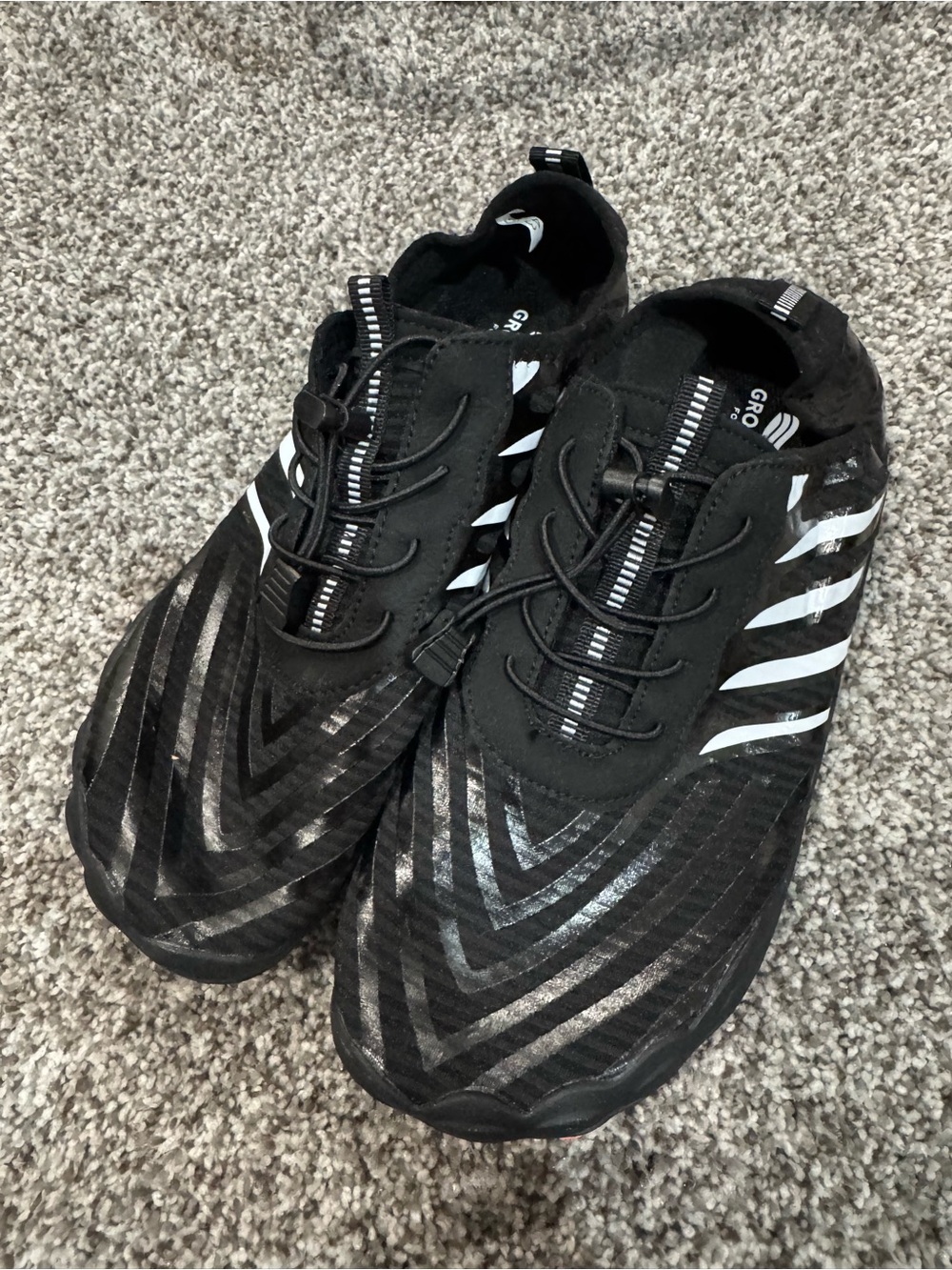 Men's Black Athletic Shoes with White Stripe Accents